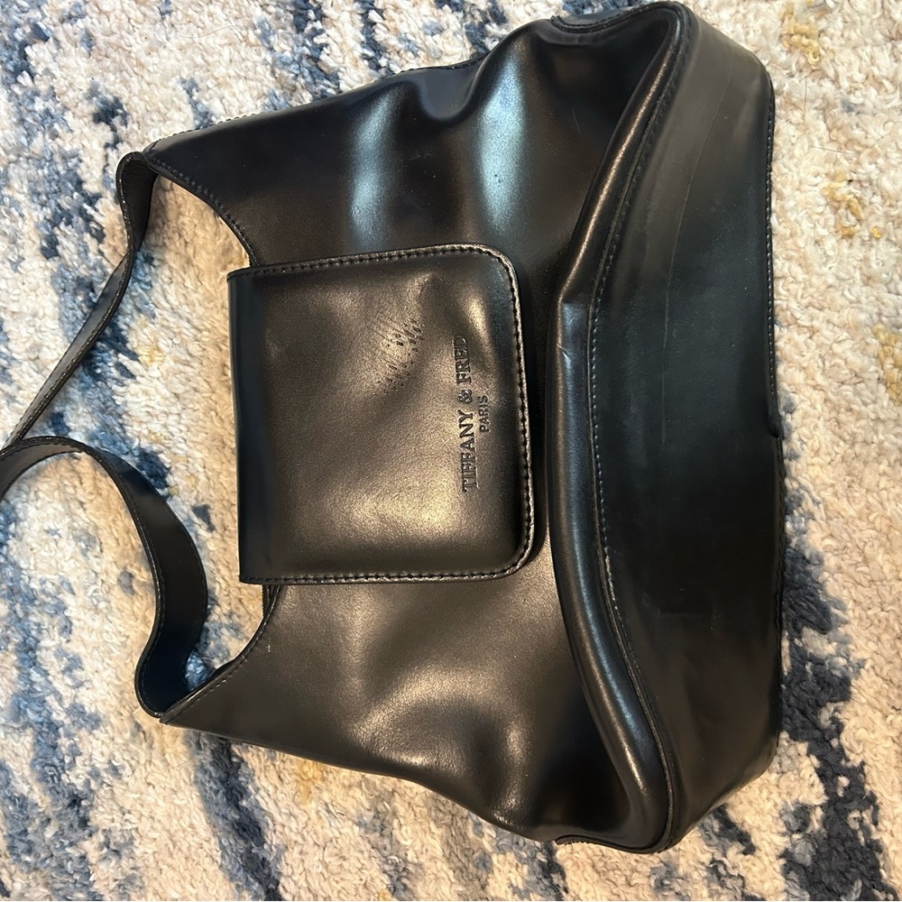 Tiffany & Fred Black Shoulder Bag with Structured Design… offers welcome